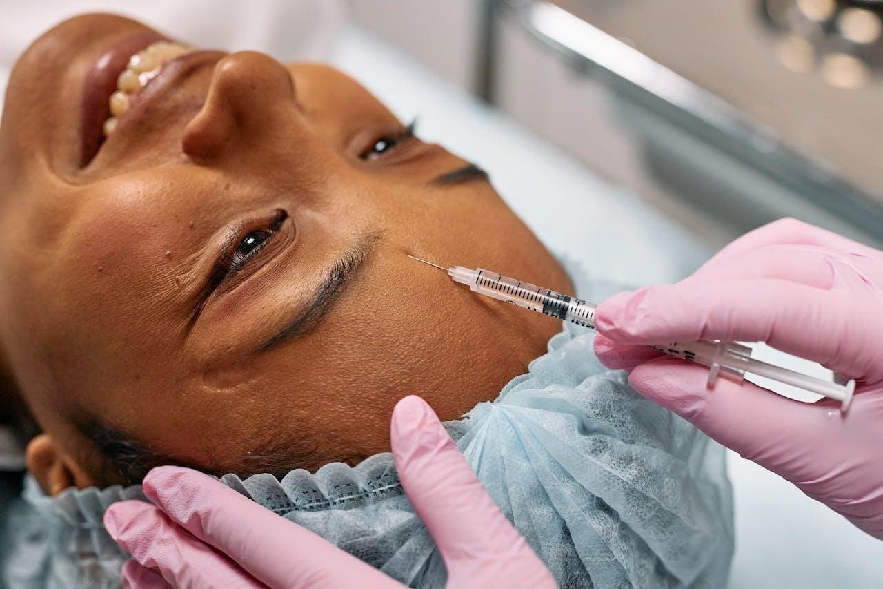 A Woman Getting a Botox Injection