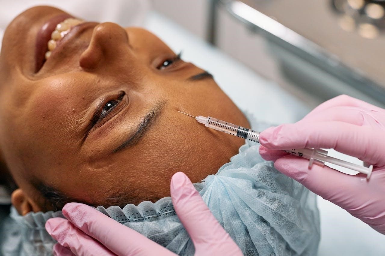 benefits of botox - Suncoast Skin Solutions A Woman Getting a Botox Injection